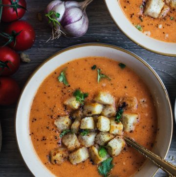 Tomato Soup and Garlic Butter Croutons in white bowl