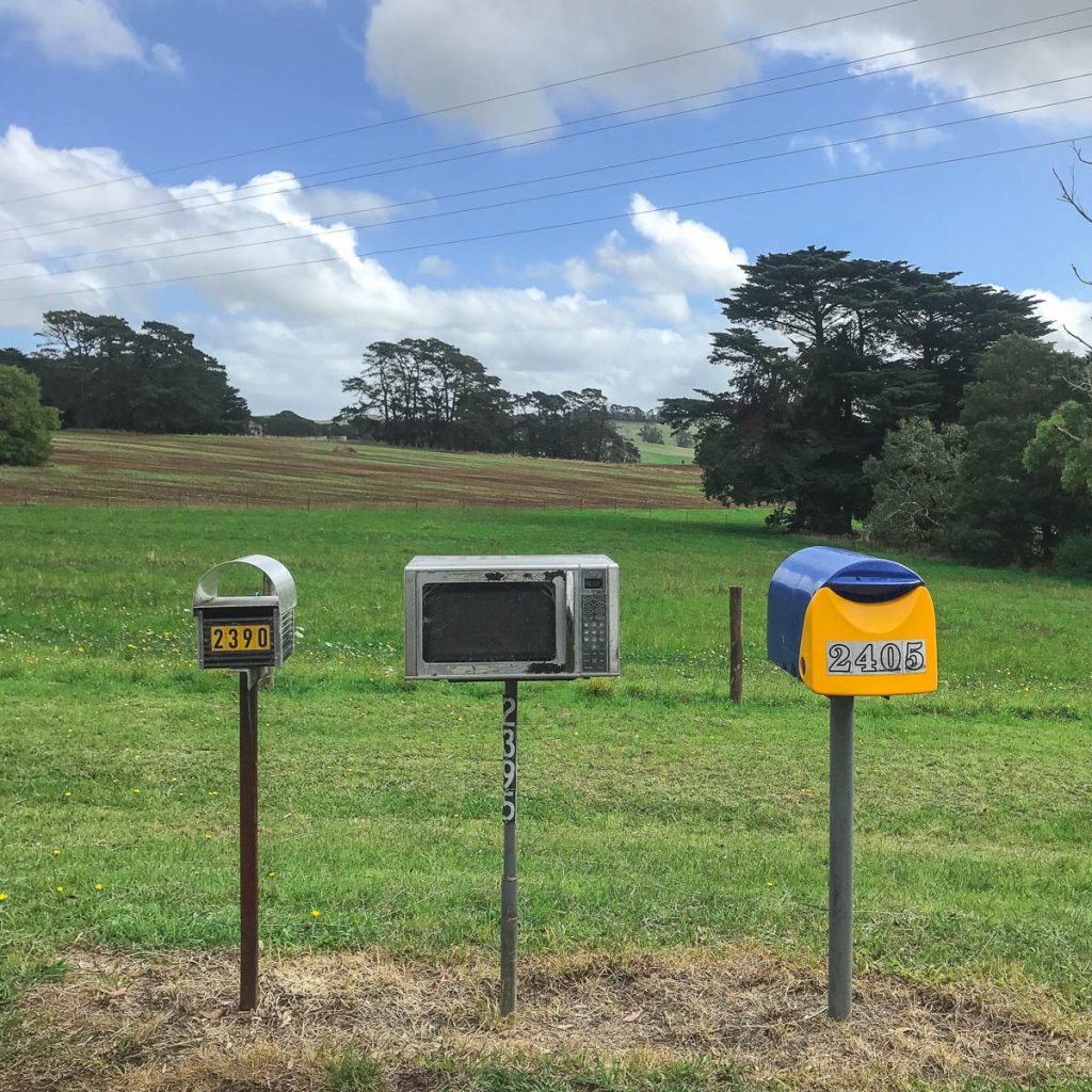 three quirky letter boxes