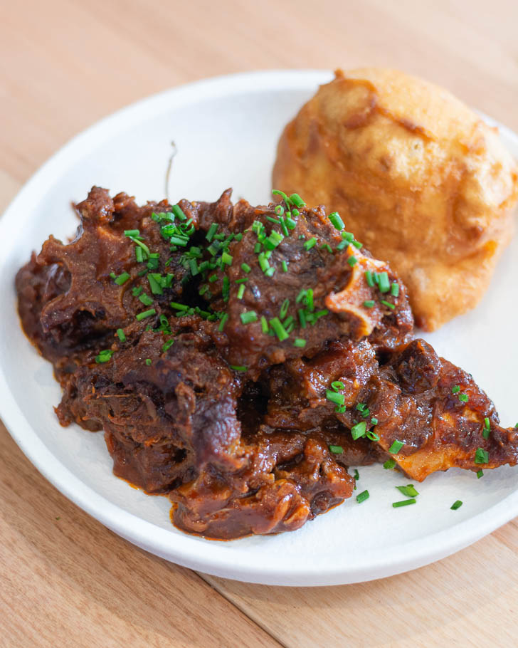 Kangaroo tail, pepperberry bourguignon, island fried scone