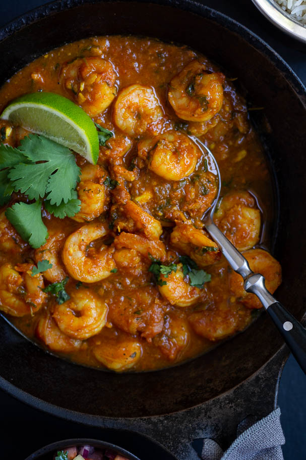 prawn curry in black cast iron pan