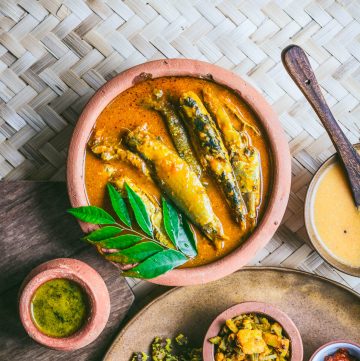 Sardine curry in a brown earthenware bowl