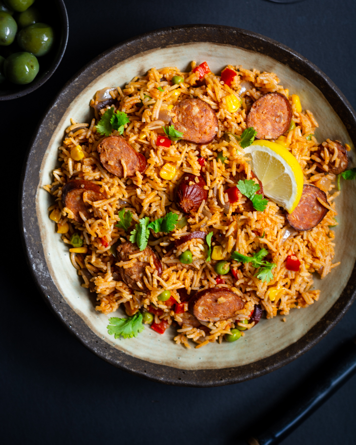 Spanish rice with chorizo in grey bowl